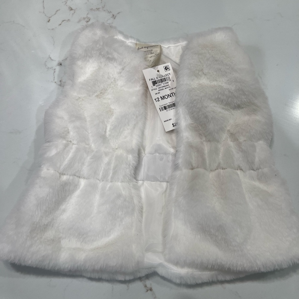 NWT First Impressions Faux Fur vest, size 12 months.